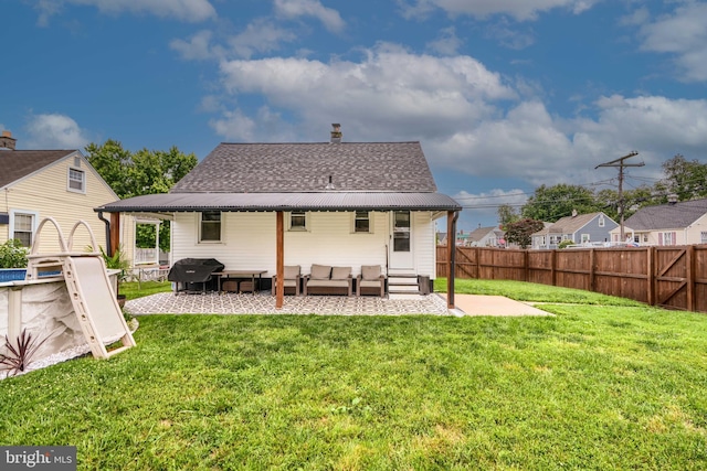 46 Avalon Ave, Dundalk, MD 21222 - rear view of property featuring an outdoor living space, entry steps, a fenced backyard, a patio area, and a shingled roof