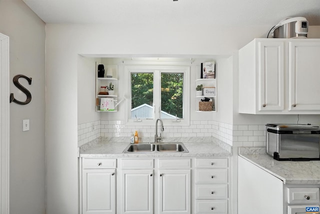 106 Alex Dr, Madison Heights, VA 24572 - kitchen with open shelves, white cabinets, and decorative backsplash