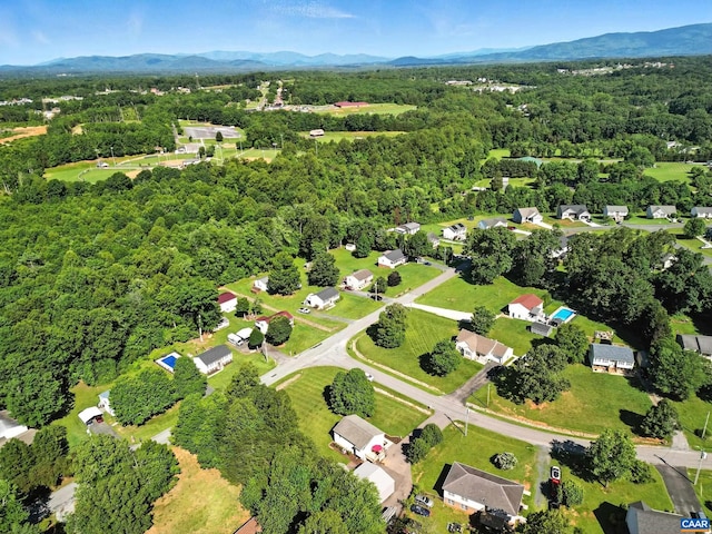 106 Alex Dr, Madison Heights, VA 24572 - aerial view of property's location featuring a heavily wooded area and a mountain backdrop