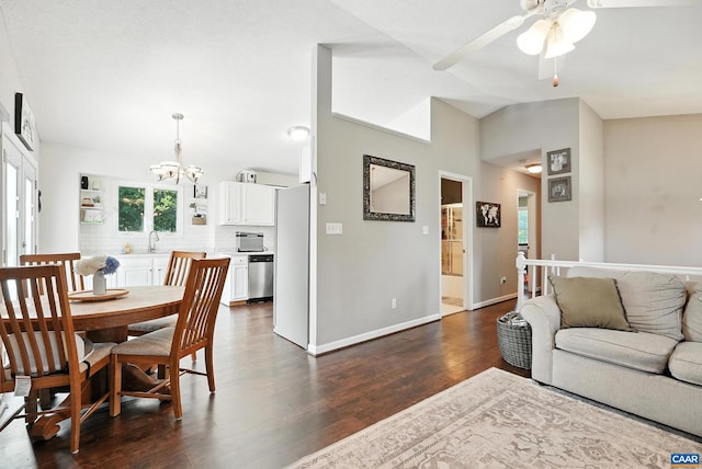 106 Alex Dr, Madison Heights, VA 24572 - living area featuring vaulted ceiling, a chandelier, dark wood finished floors, and a ceiling fan