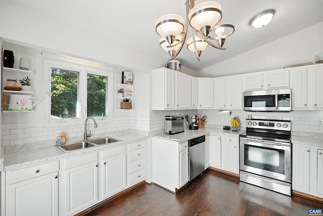106 Alex Dr, Madison Heights, VA 24572 - kitchen with appliances with stainless steel finishes, open shelves, lofted ceiling, and backsplash