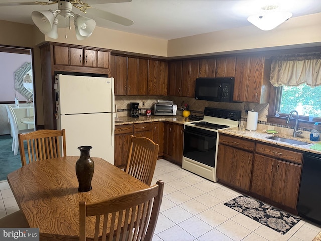 21 Stratton Dr, Hamilton, NJ 08690 - kitchen with black appliances, decorative backsplash, a ceiling fan, and dark brown cabinetry
