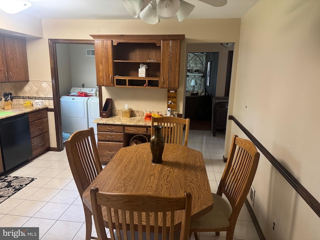 21 Stratton Dr, Hamilton, NJ 08690 - dining space with washer and dryer, light tile patterned floors, and ceiling fan