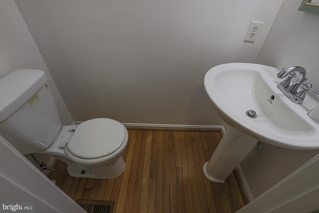 4845 Wainwright Cir, Owings Mills, MD 21117 - bathroom with hardwood / wood-style floors and toilet