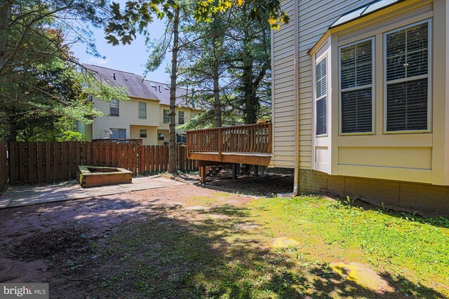 4845 Wainwright Cir, Owings Mills, MD 21117 - view of yard featuring a deck and a patio