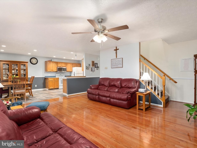31 Westminster Dr, Front Royal, VA 22630 - living area with stairs, light wood-type flooring, recessed lighting, and a ceiling fan