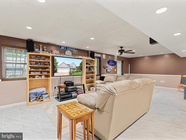 31 Westminster Dr, Front Royal, VA 22630 - living room with a textured ceiling, a ceiling fan, recessed lighting, and marble look tile flooring
