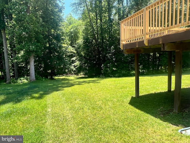 9802 Fox Run Dr, Clinton, MD 20735 - view of grassy yard featuring a deck