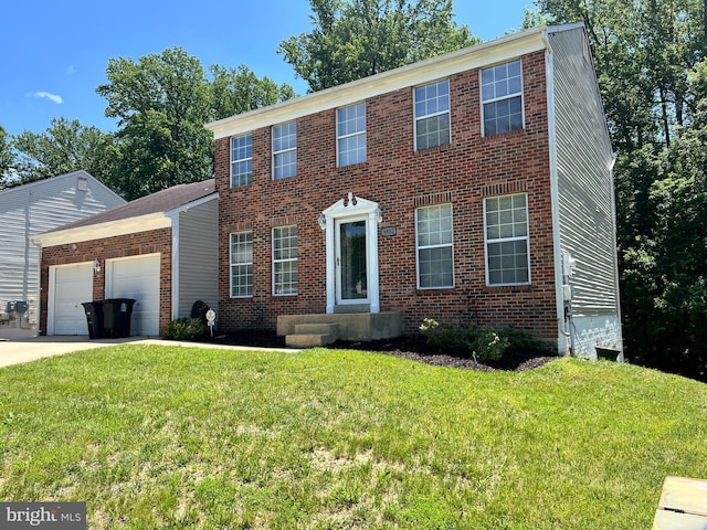 9802 Fox Run Dr, Clinton, MD 20735 - colonial inspired home with an attached garage, a front lawn, concrete driveway, and brick siding