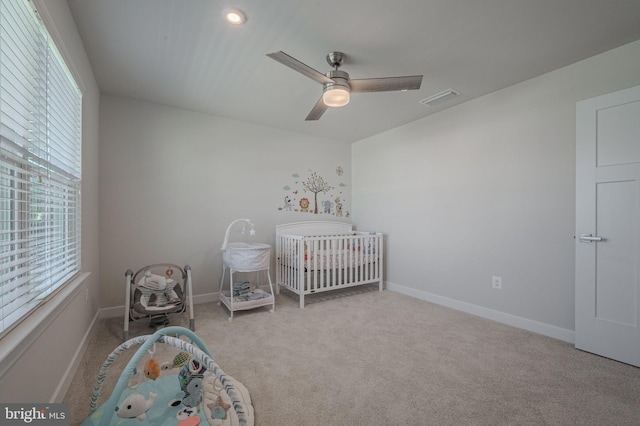303 Jasper Way, Middletown, DE 19709 - bedroom featuring a nursery area, carpet, and a ceiling fan