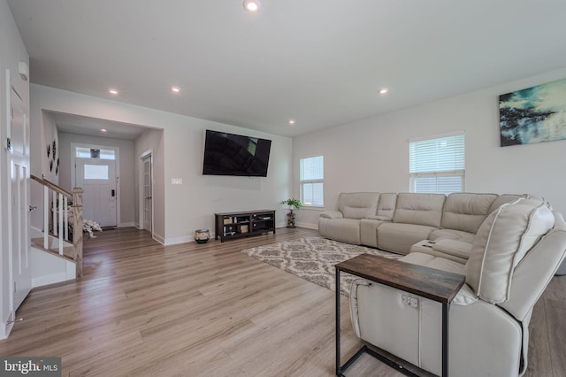 303 Jasper Way, Middletown, DE 19709 - living room with light wood-style floors, stairway, and recessed lighting