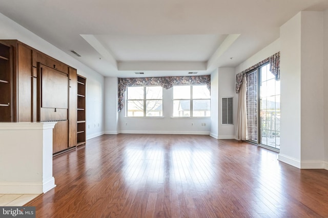 2019 Windrow Dr, Princeton, NJ 08540 - empty room with a raised ceiling and dark wood-style floors