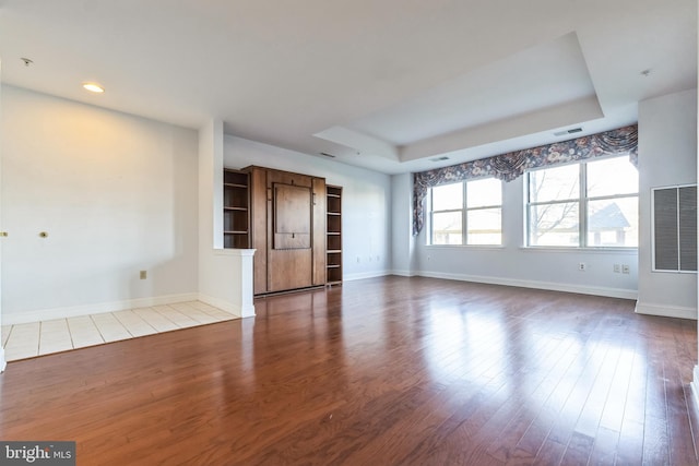 2019 Windrow Dr, Princeton, NJ 08540 - spare room featuring wood finished floors, a raised ceiling, and recessed lighting