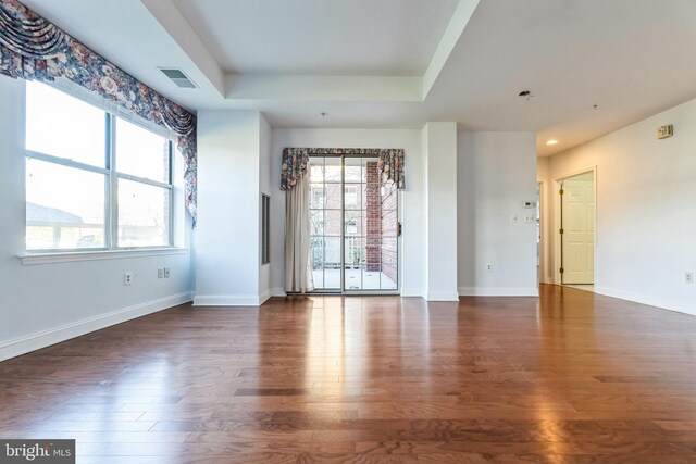 2019 Windrow Dr, Princeton, NJ 08540 - unfurnished room with plenty of natural light, wood finished floors, a raised ceiling, and recessed lighting