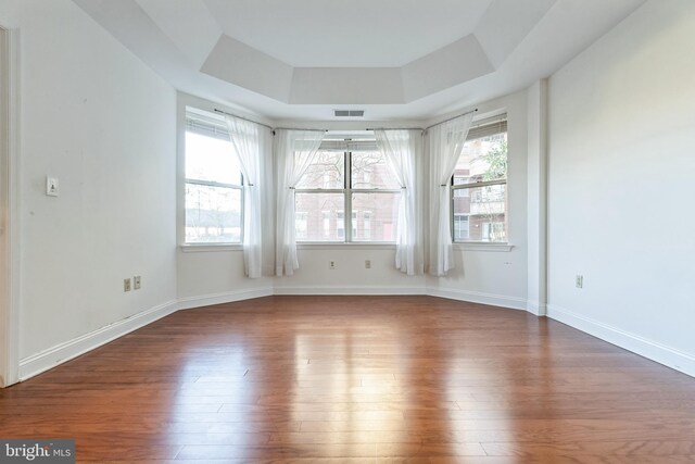 2019 Windrow Dr, Princeton, NJ 08540 - spare room featuring a raised ceiling and hardwood / wood-style floors