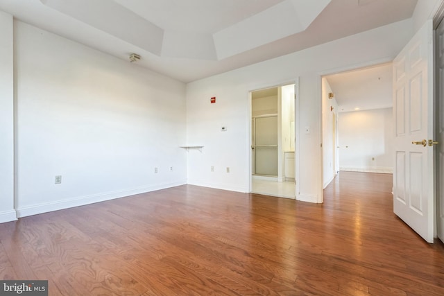 2019 Windrow Dr, Princeton, NJ 08540 - unfurnished room featuring a tray ceiling and wood finished floors