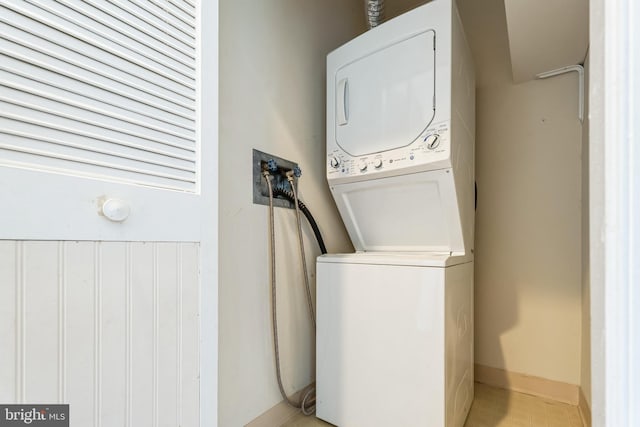 2019 Windrow Dr, Princeton, NJ 08540 - laundry area featuring stacked washing machine and dryer and baseboards