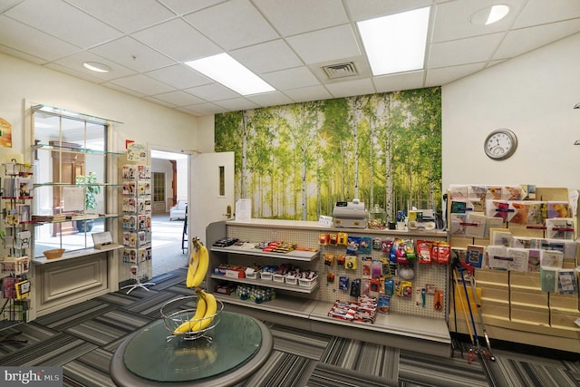 2019 Windrow Dr, Princeton, NJ 08540 - misc room featuring an accent wall, a paneled ceiling, wallpapered walls, and carpet