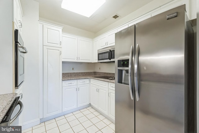2019 Windrow Dr, Princeton, NJ 08540 - kitchen with stainless steel appliances, white cabinets, and light tile patterned floors