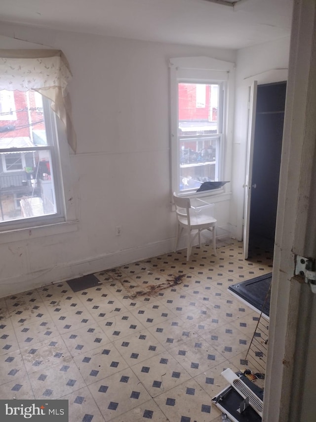 2714 E Biddle St, Baltimore, MD 21213 - spare room featuring light flooring
