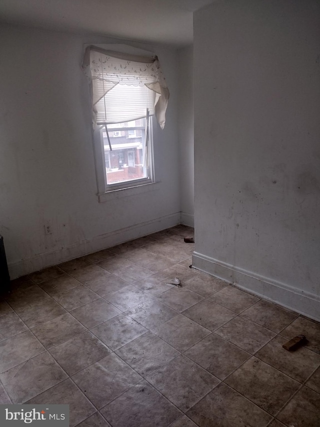 2714 E Biddle St, Baltimore, MD 21213 - spare room featuring tile patterned flooring