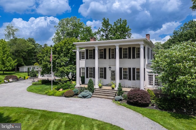 1375 Kirkland Ave, West Chester, PA 19380 - neoclassical home with a chimney and stucco siding