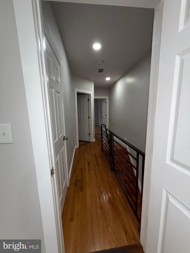 3844 N Franklin St, Philadelphia, PA 19140 - hallway with an upstairs landing, wood finished floors, and recessed lighting