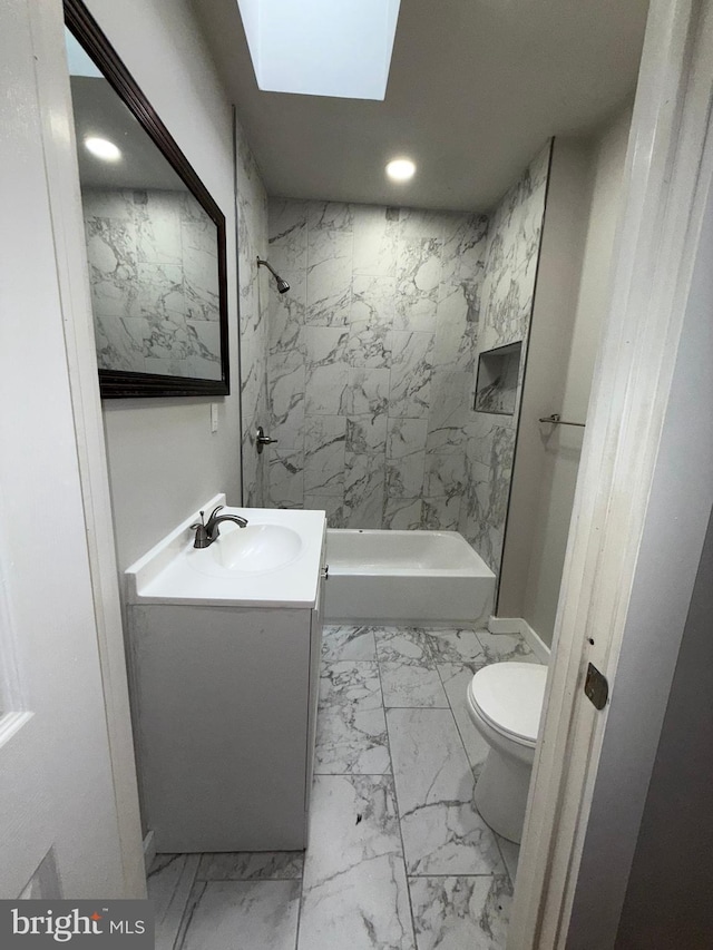 3844 N Franklin St, Philadelphia, PA 19140 - bathroom with marble look tile flooring, vanity, recessed lighting, a skylight, and bathtub / shower combination