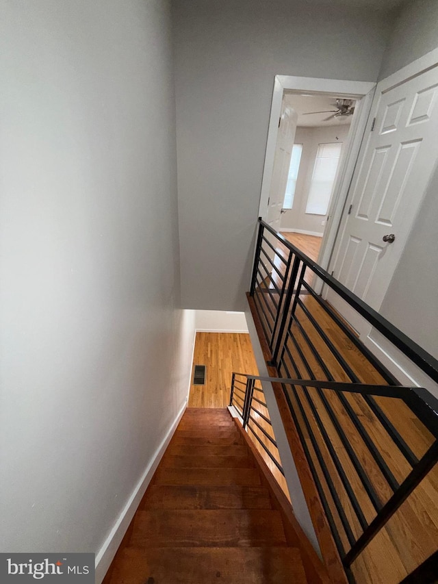 3844 N Franklin St, Philadelphia, PA 19140 - stairway featuring baseboards and wood finished floors