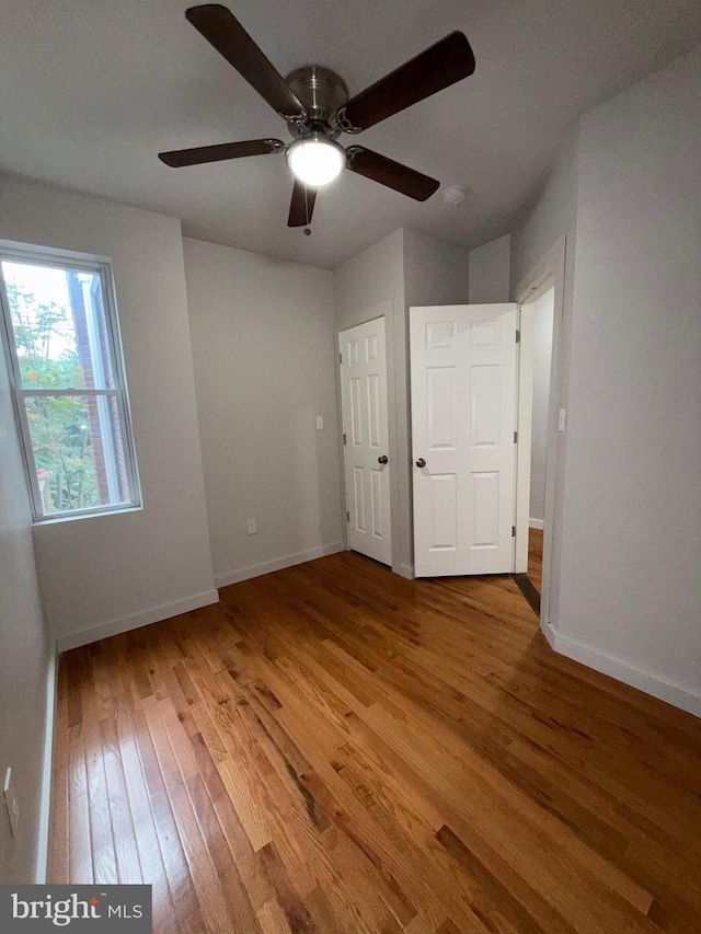 3844 N Franklin St, Philadelphia, PA 19140 - unfurnished bedroom with wood finished floors and ceiling fan