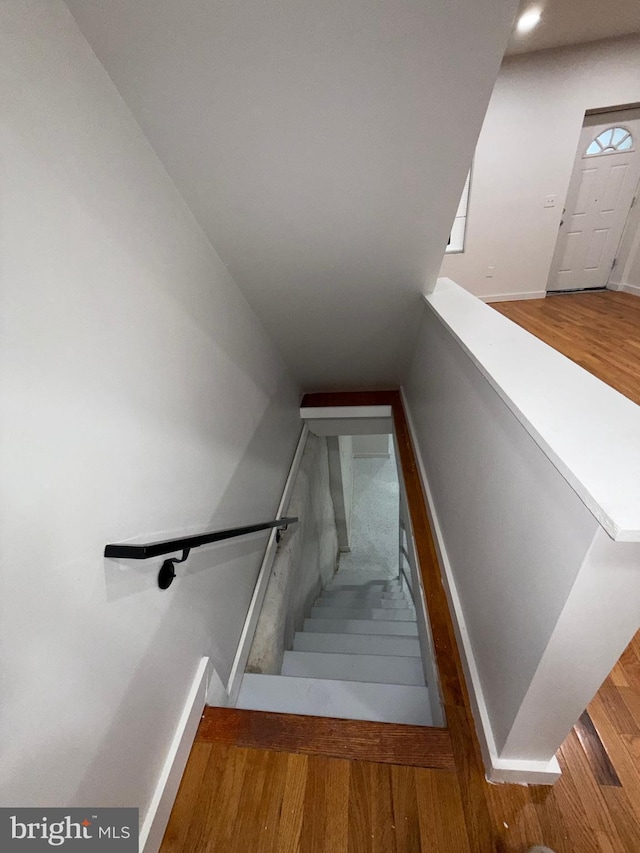 3844 N Franklin St, Philadelphia, PA 19140 - staircase featuring wood finished floors and lofted ceiling