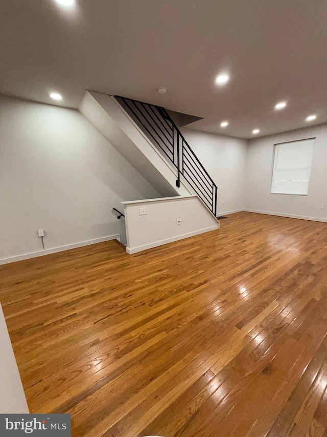 3844 N Franklin St, Philadelphia, PA 19140 - unfurnished living room with hardwood / wood-style flooring, recessed lighting, and stairway