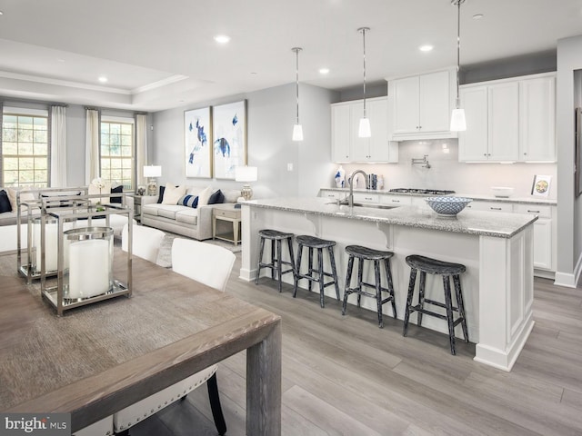 9976 Baker Ln, Ellicott City, MD 21042 - dining area with light wood-style flooring, recessed lighting, and a raised ceiling