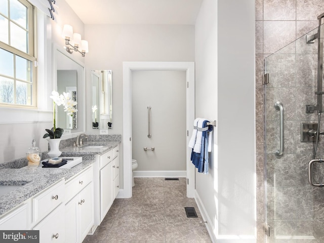 9976 Baker Ln, Ellicott City, MD 21042 - bathroom featuring double vanity and a stall shower