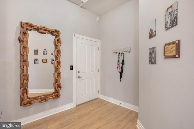 4480 Market Commons Dr Unit 215, Fairfax, VA 22033 - entrance foyer featuring light wood finished floors and baseboards