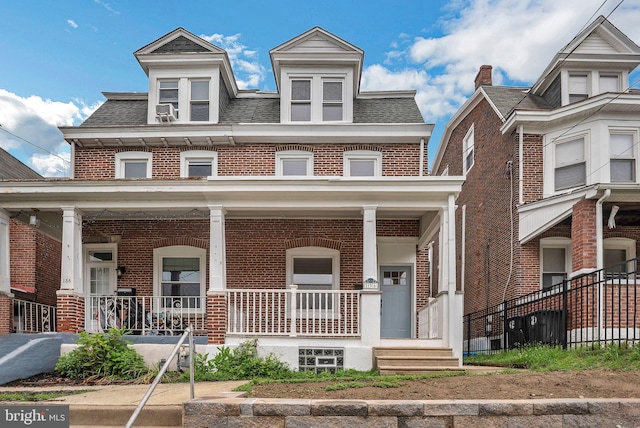 136 W 3rd Ave, Conshohocken, PA 19428 - view of property featuring covered porch and brick siding