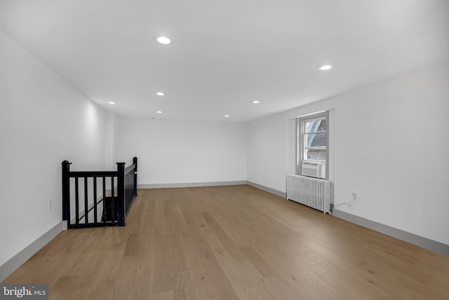 136 W 3rd Ave, Conshohocken, PA 19428 - empty room featuring radiator, recessed lighting, and light wood-style floors