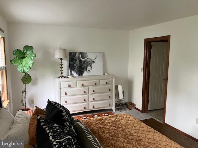 409 Rhoda Dr, Lancaster, PA 17601 - bedroom featuring baseboards and wood finished floors