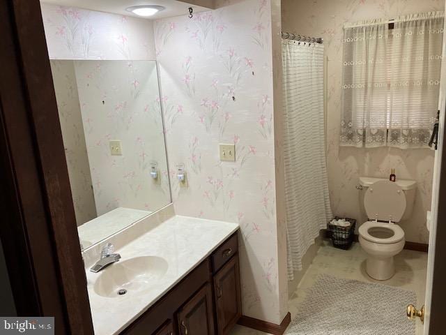 409 Rhoda Dr, Lancaster, PA 17601 - bathroom featuring vanity, curtained shower, and wallpapered walls