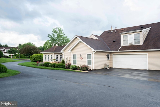 3301 Shellers Bnd Unit 909, State College, PA 16801 - view of front of property with driveway, a garage, and roof with shingles