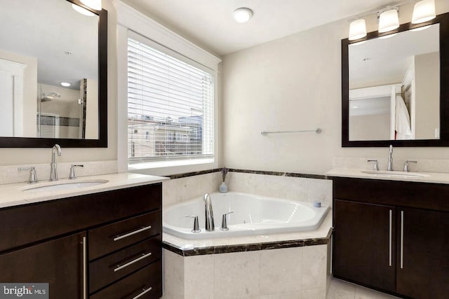 1904 Vermont Ave NW Unit A, Washington, DC 20001 - bathroom featuring two vanities, a garden tub, and a shower stall