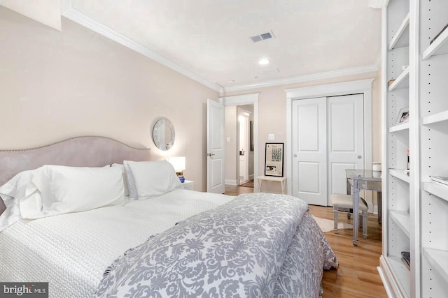 1904 Vermont Ave NW Unit A, Washington, DC 20001 - bedroom featuring wood finished floors, a closet, and crown molding