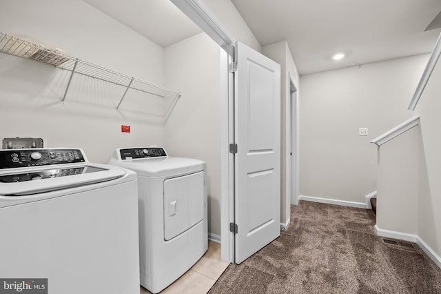 620 Mozart Way, Baltimore, MD 21224 - laundry room featuring washing machine and dryer, light carpet, and recessed lighting