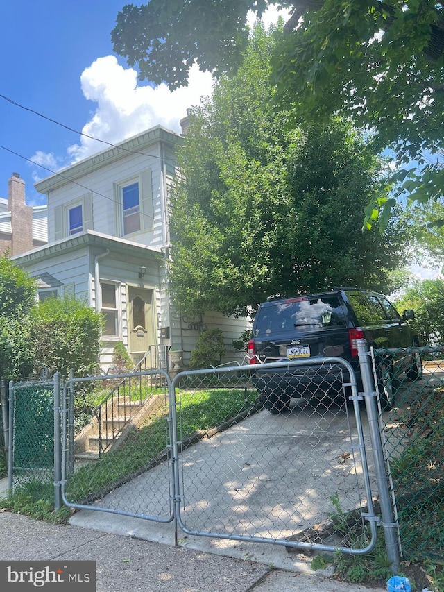 4425 E Howell St, Philadelphia, PA 19135 - view of property exterior featuring a gate and a fenced front yard