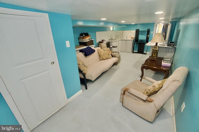 4425 E Howell St, Philadelphia, PA 19135 - living area featuring concrete floors and recessed lighting