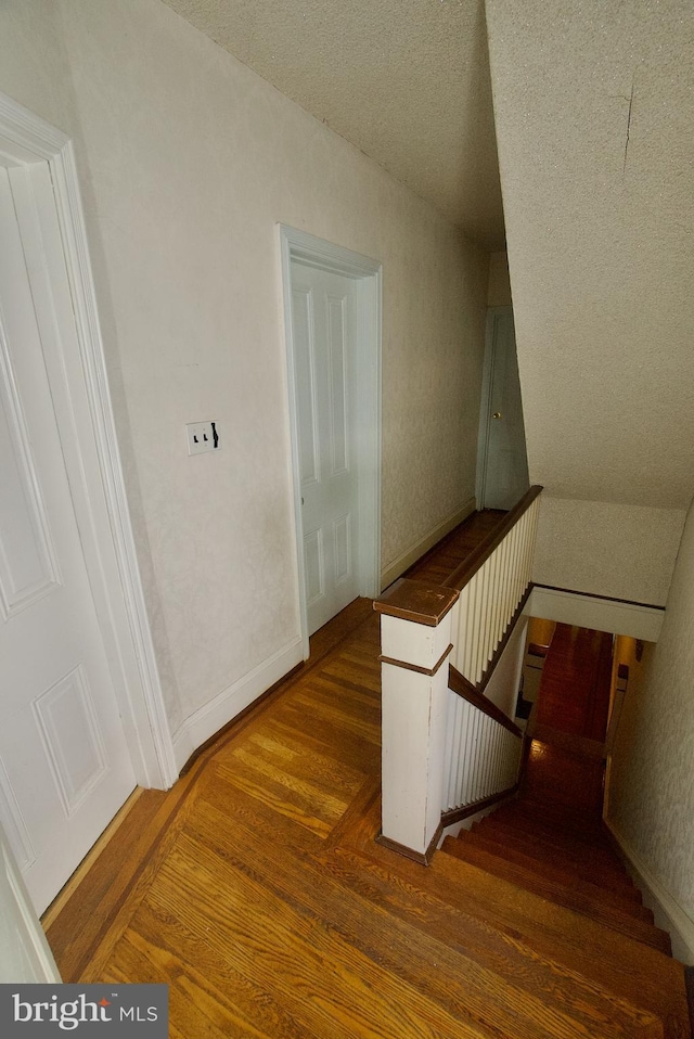 4425 E Howell St, Philadelphia, PA 19135 - stairway with wood finished floors and baseboards