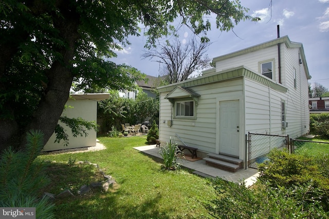 4425 E Howell St, Philadelphia, PA 19135 - rear view of house featuring entry steps