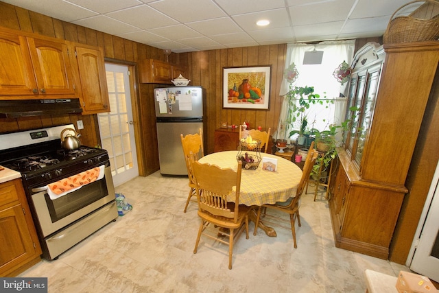 4425 E Howell St, Philadelphia, PA 19135 - dining area with wood walls and a paneled ceiling