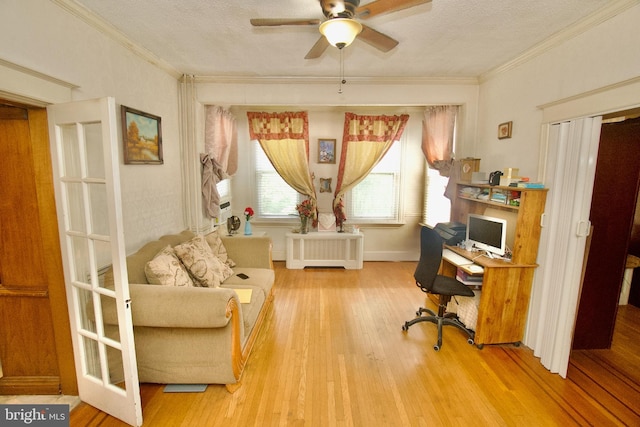 4425 E Howell St, Philadelphia, PA 19135 - home office with radiator, ceiling fan, wood finished floors, crown molding, and a textured ceiling