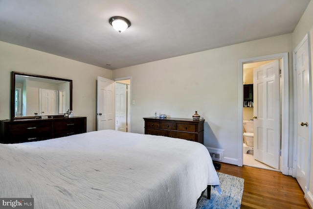 4408 Saul Rd, Kensington, MD 20895 - bedroom with wood finished floors and ensuite bath